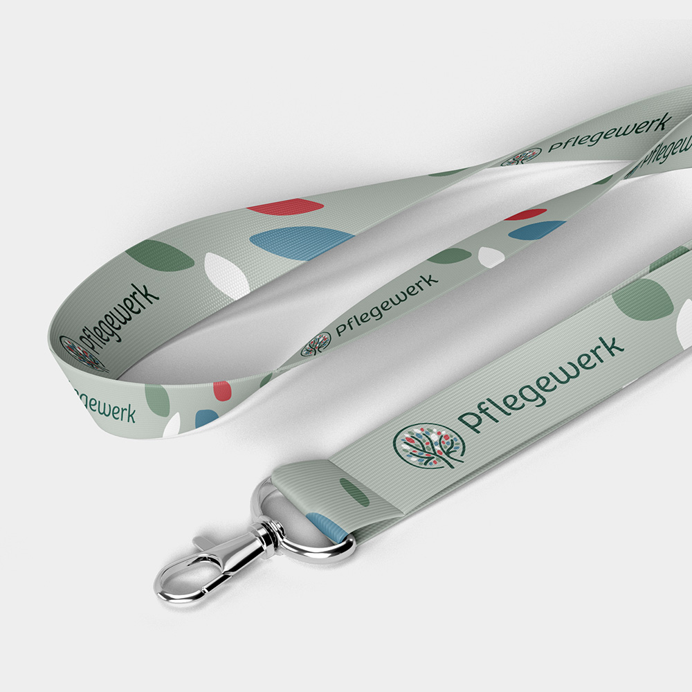 Lanyards des Pflegewerks in neuem Corporate Design.
